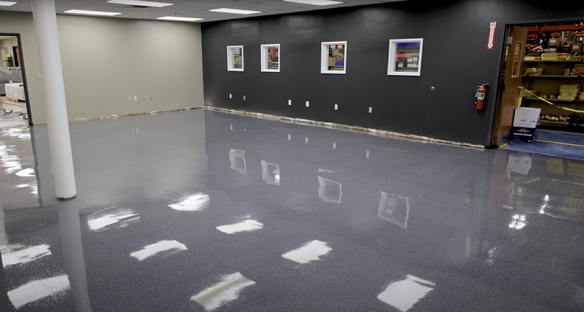 Professional concrete floor installation showing polished concrete surface in Burien, WA
