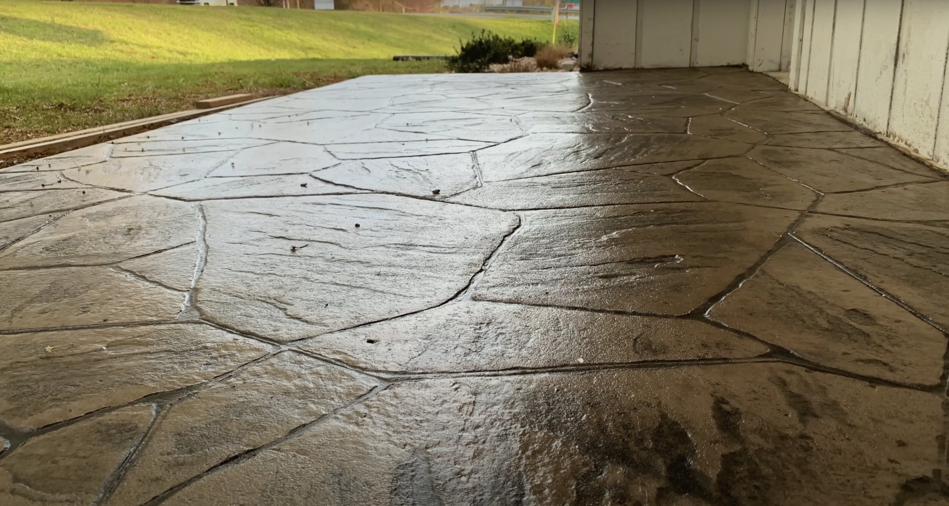 Cracked concrete driveway requiring professional repair services in Burien, WA