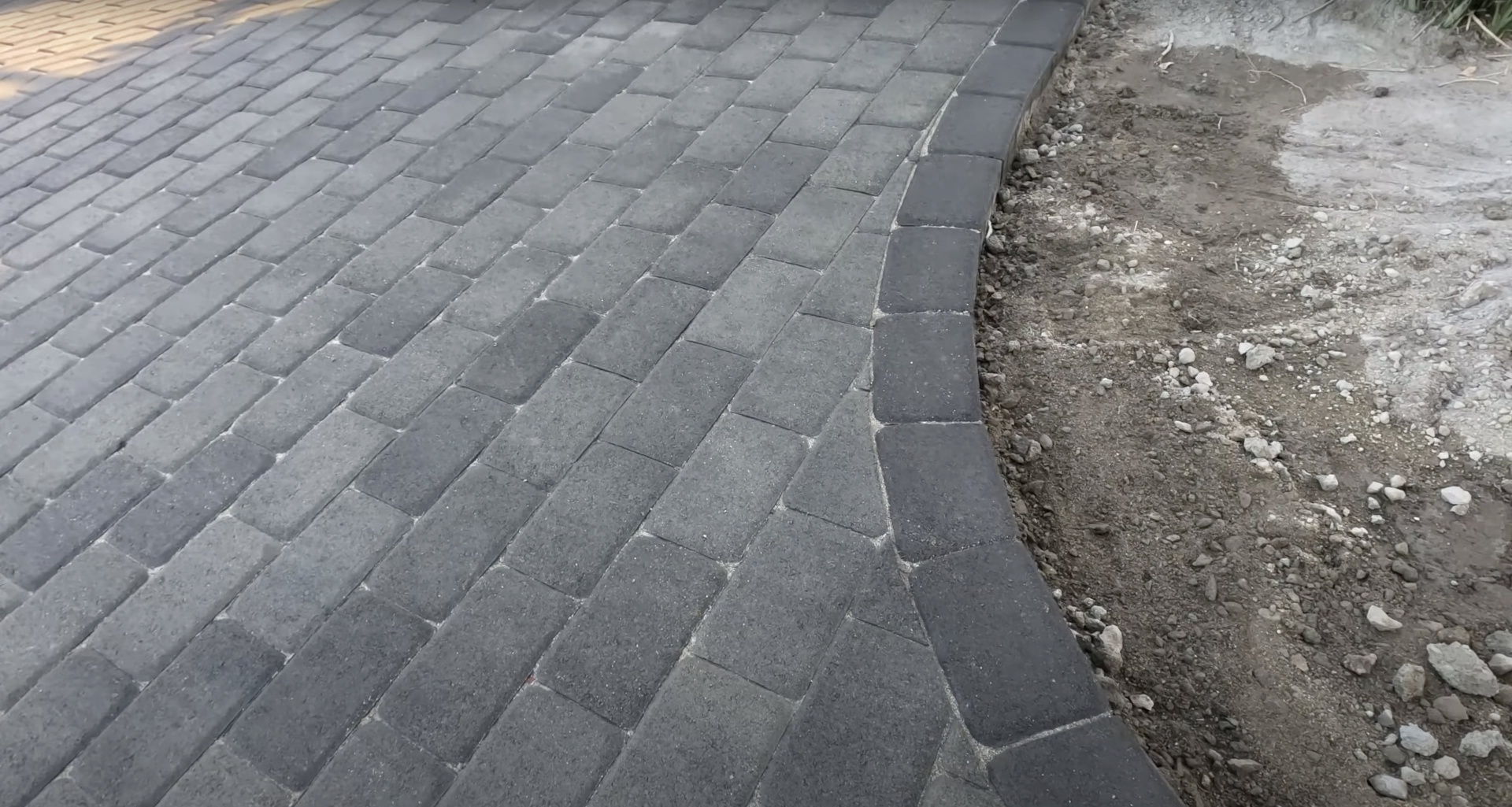 High-quality concrete paver installation in progress showing professional workmanship