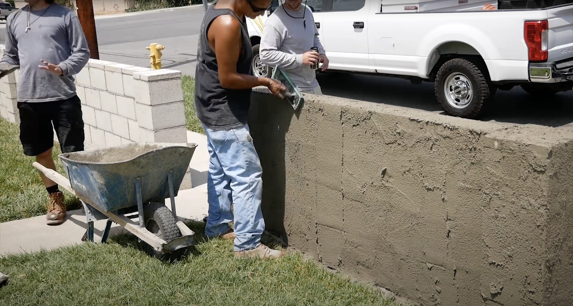 Professional concrete repair crew working on residential concrete project in Burien